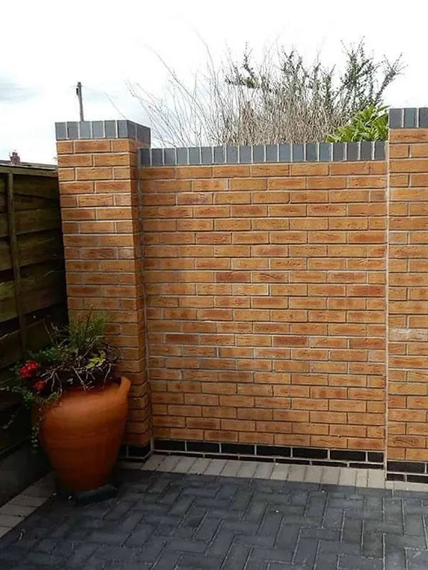 Tall brick wall
