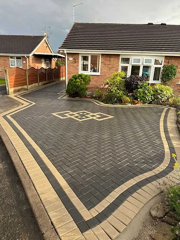 Grey and cream block paved driveway